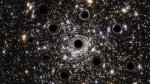 Swarm-of-Black-Holes-NGC-6397-ESAHubble-N.-Bartmann-e1613400323457.jpg